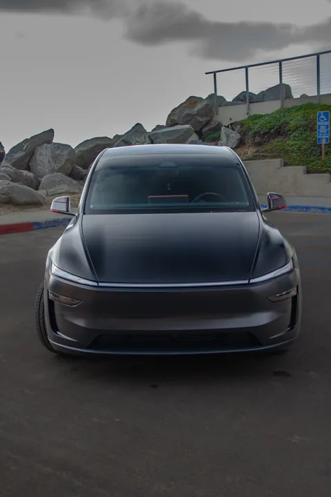 Tesla Model Y (2025), Satin black with red accents